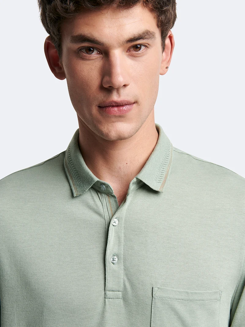 Polo manches courtes en viscose faux-uni