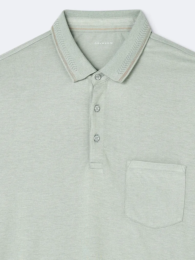 Polo manches courtes en viscose faux-uni