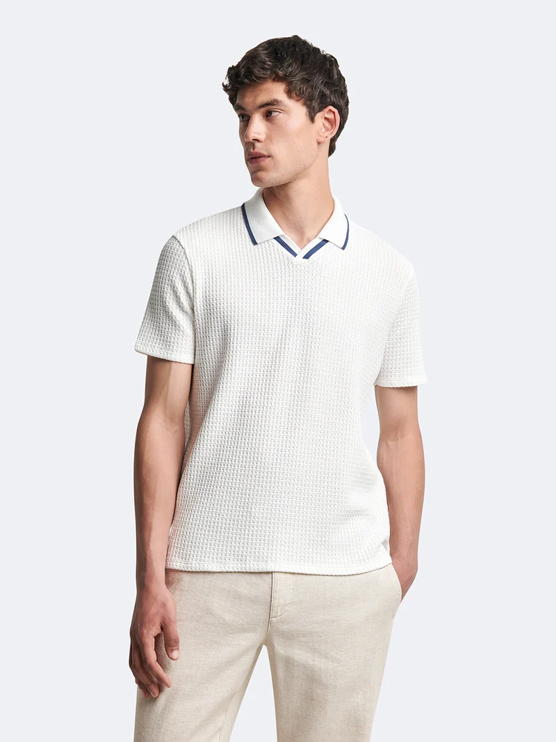 Polo manches courtes en coton col requin