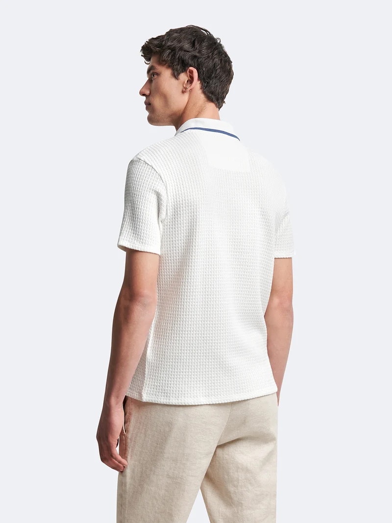 Polo manches courtes en coton col requin