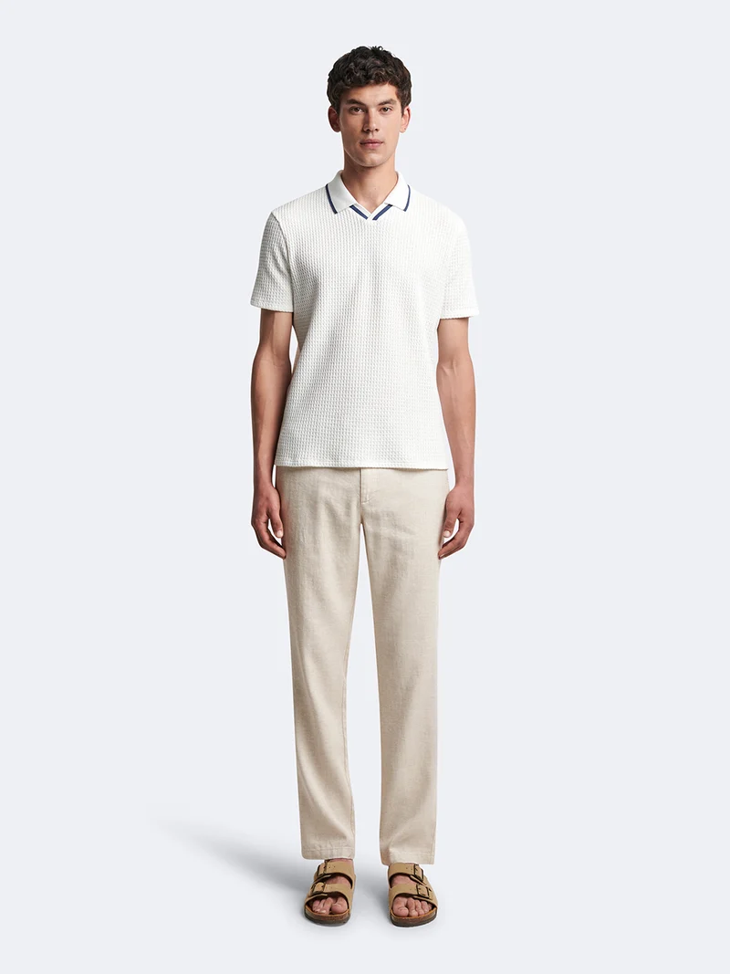 Polo manches courtes en coton col requin