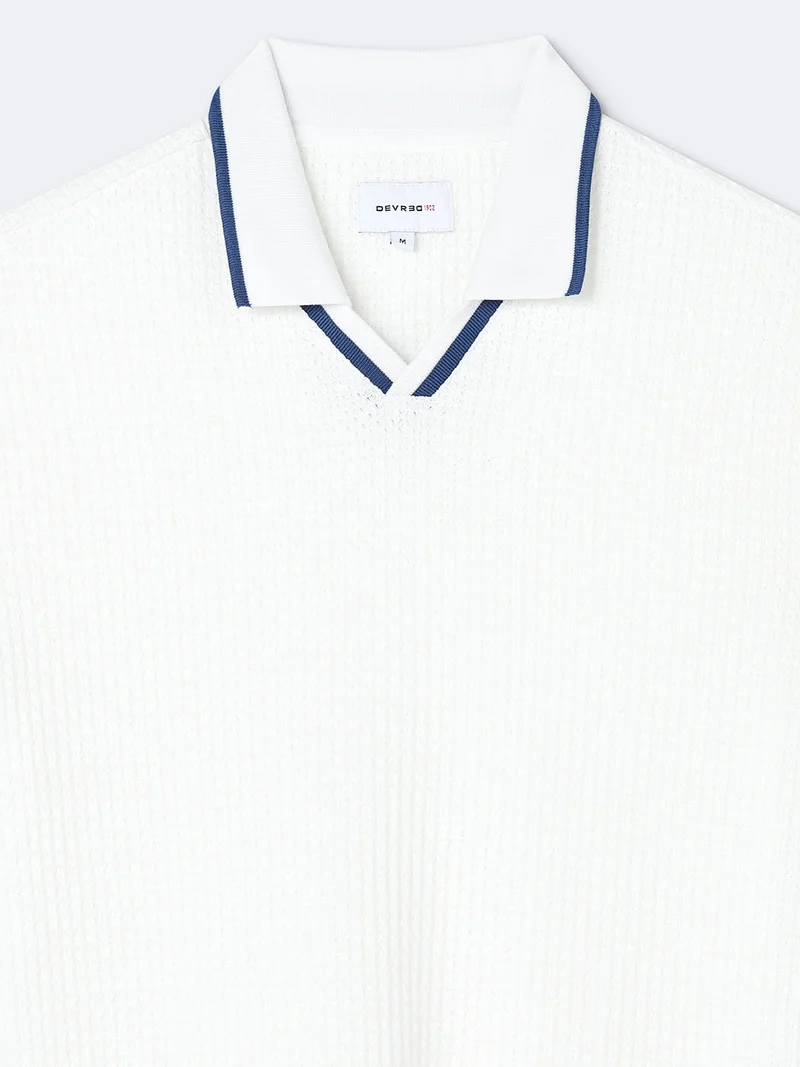 Polo manches courtes en coton col requin