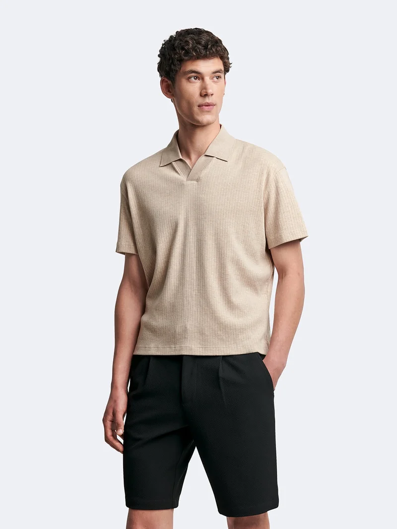 Polo manches courtes en coton col requin