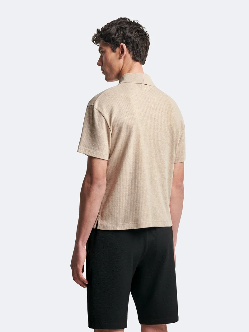 Polo manches courtes en coton col requin