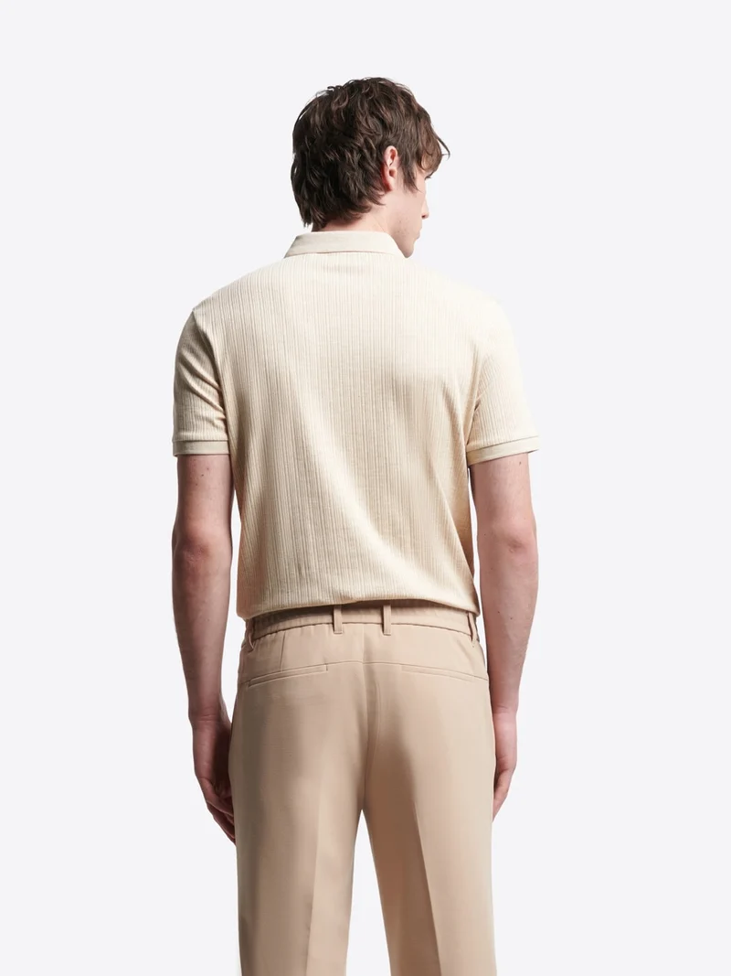 Polo col boutonné en coton