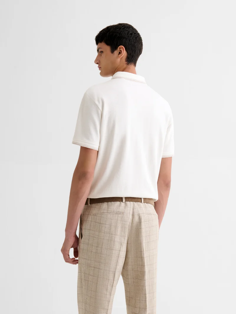 Polo boutonné en jacquard
