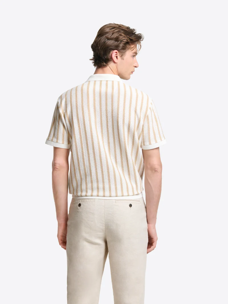 Polo col ouvert en maille rayée
