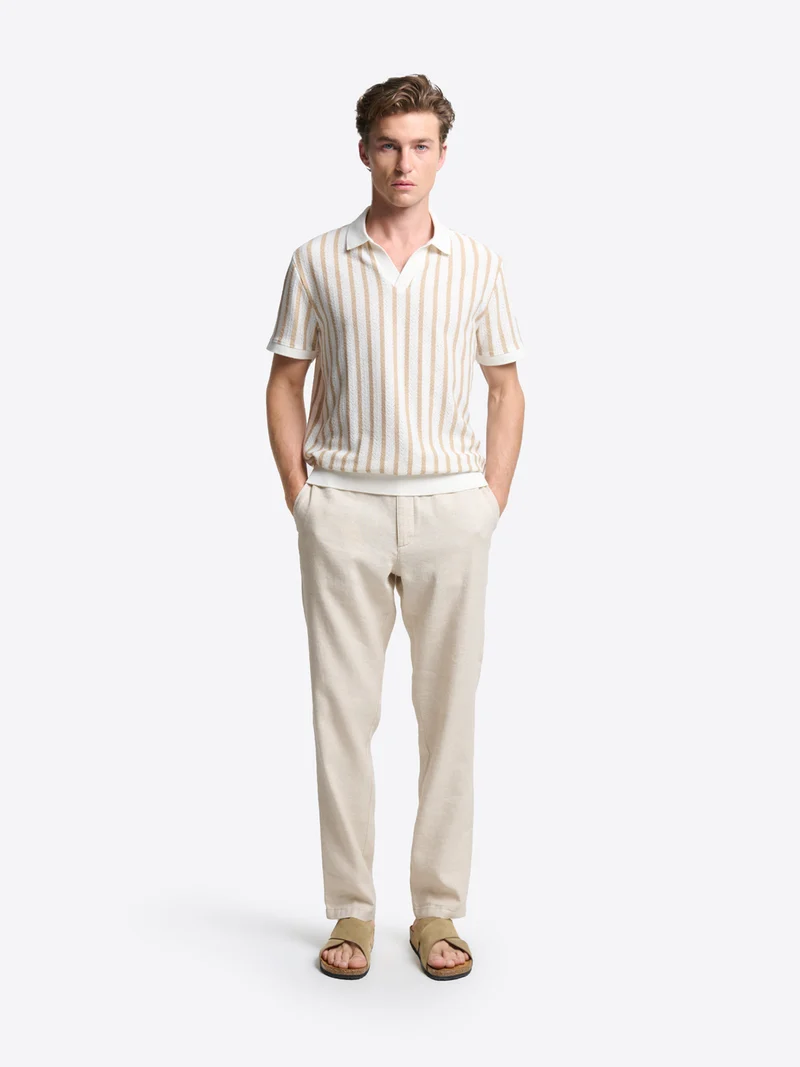 Polo col ouvert en maille rayée