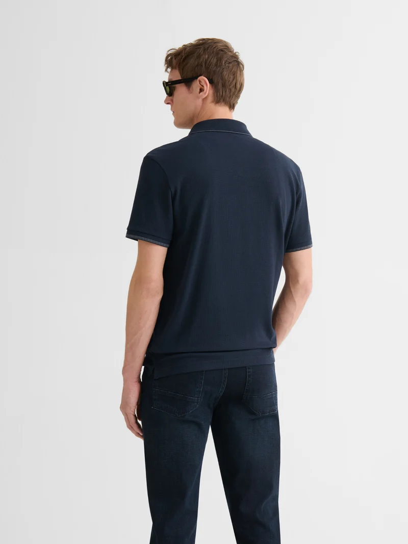 Polo boutonné gauffré