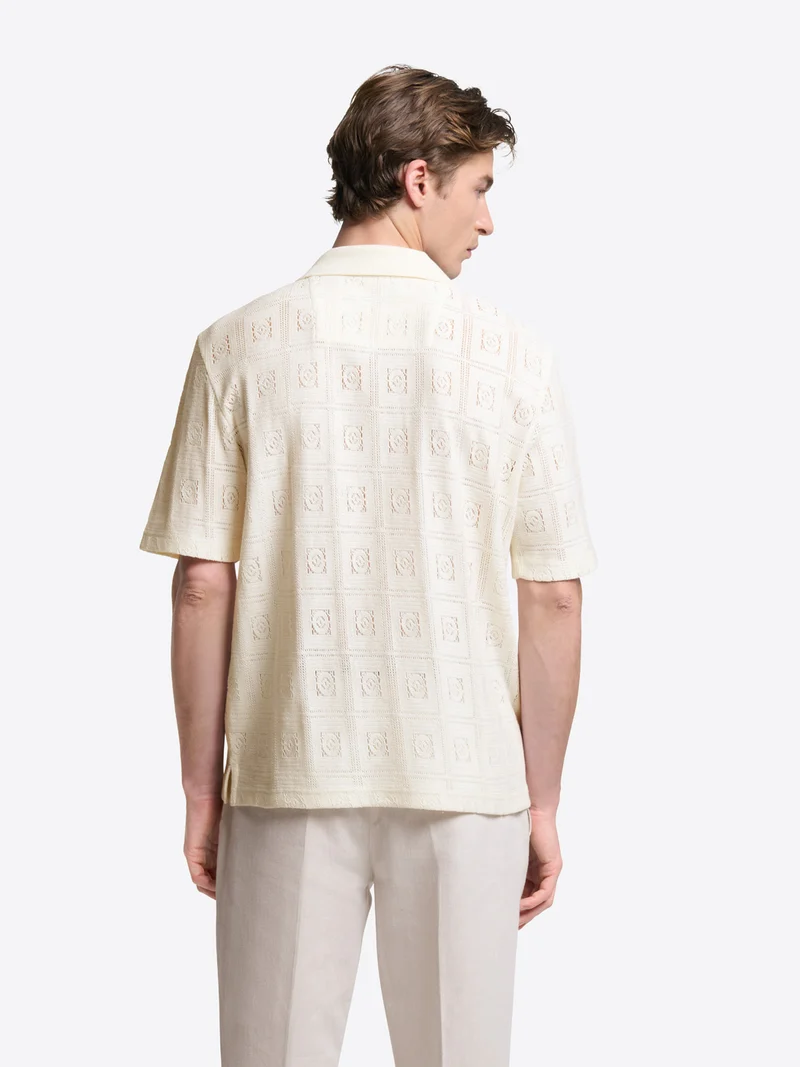 Polo col boutonné en maille crochet