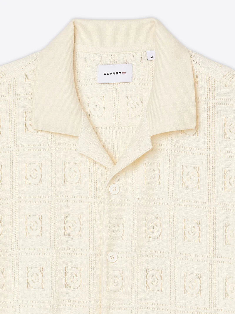Polo col boutonné en maille crochet