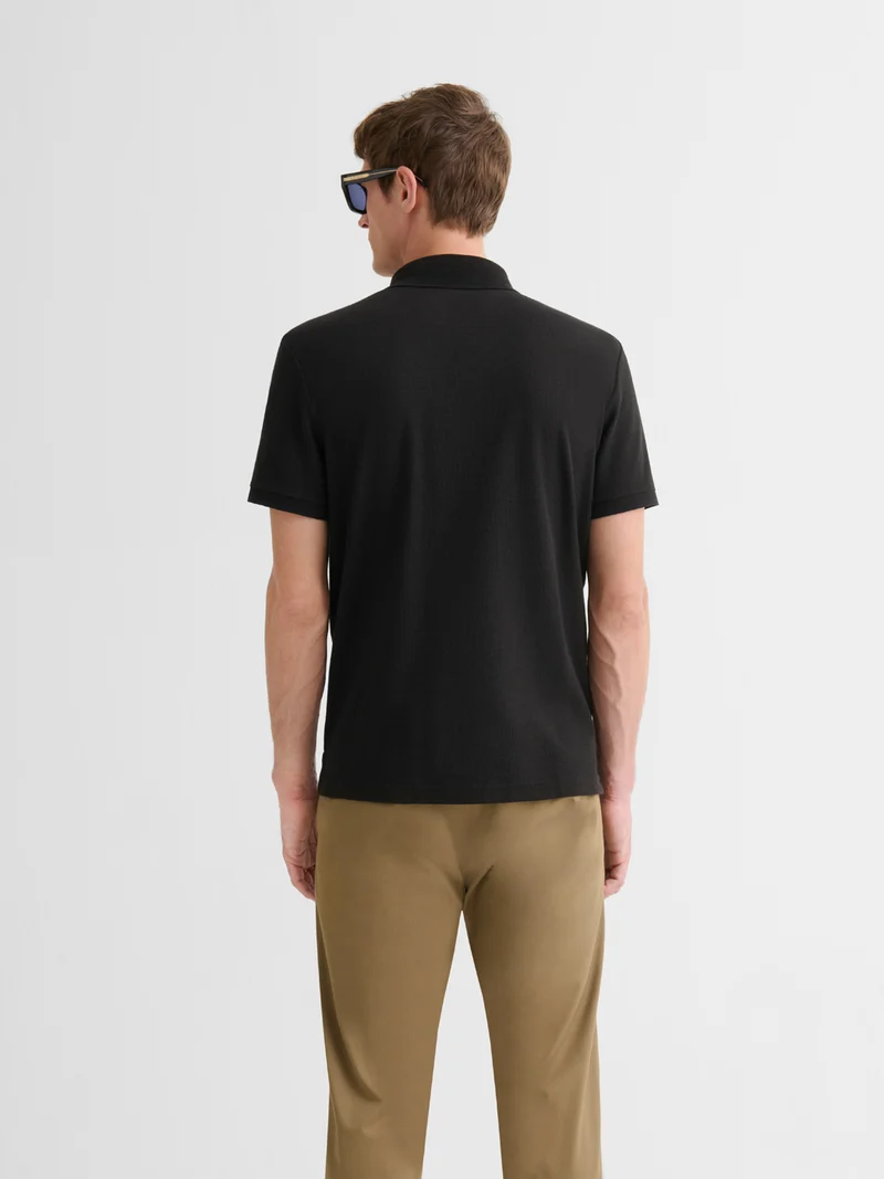 Polo boutonné gauffré