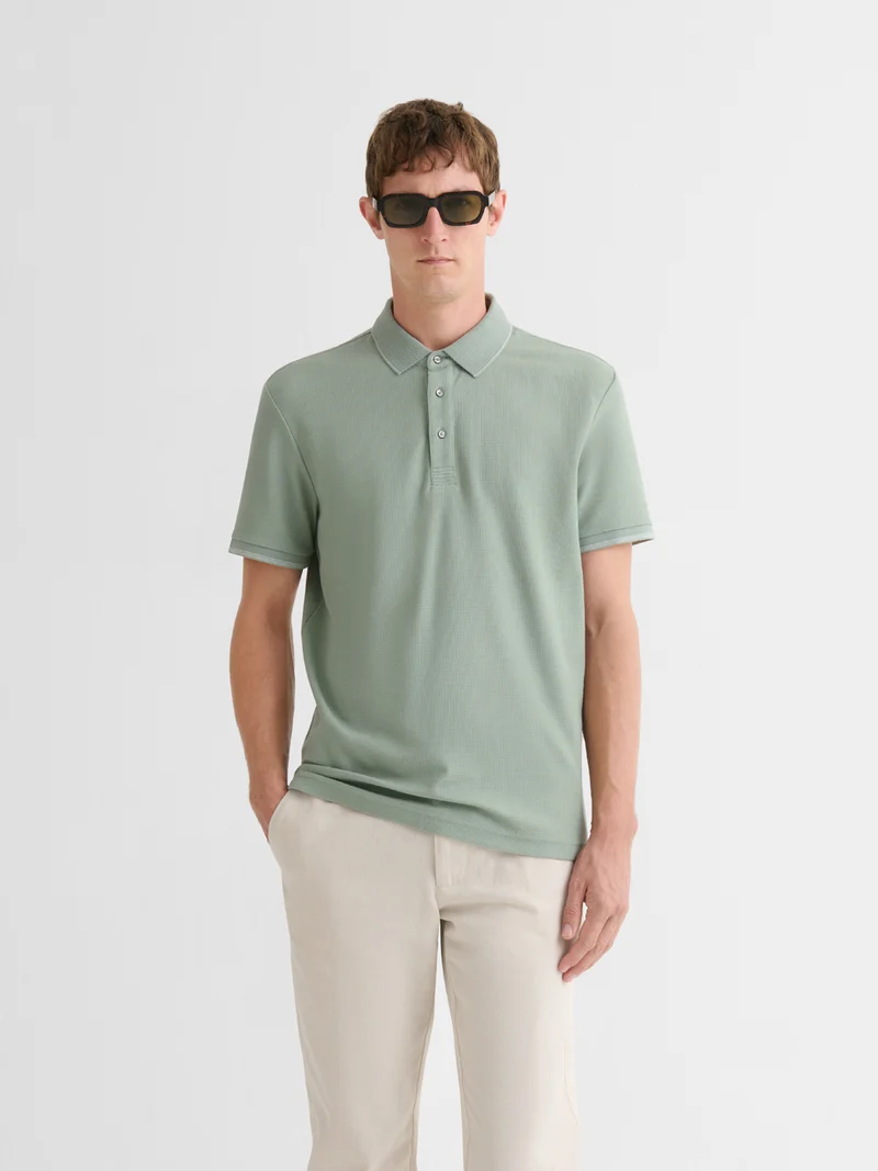 Polo boutonné gauffré