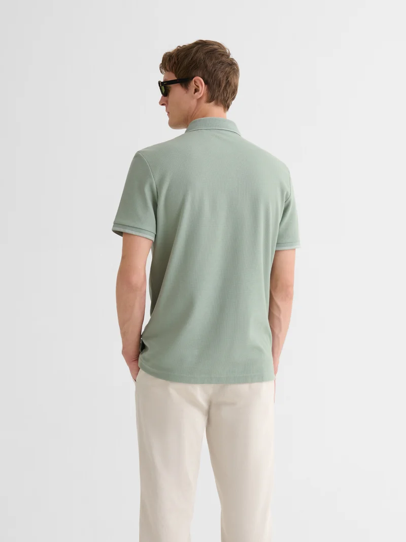 Polo boutonné gauffré