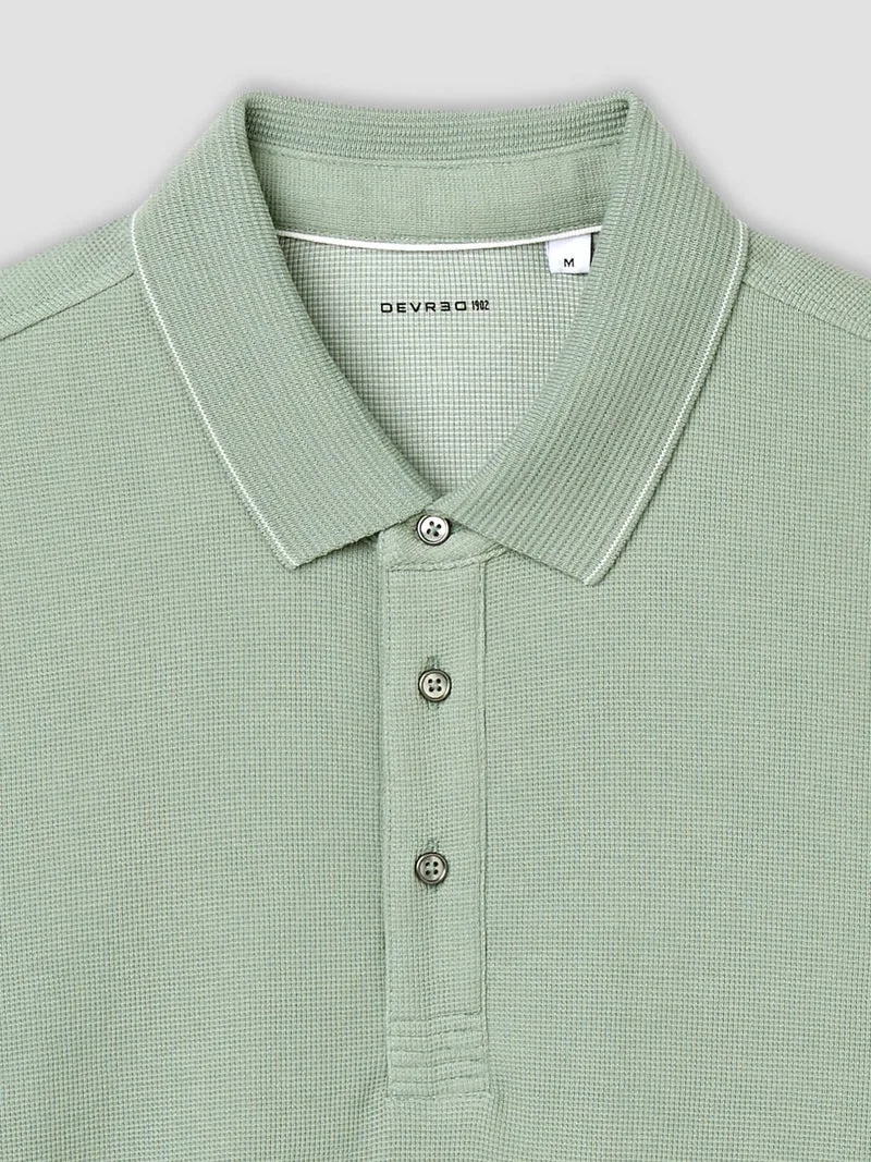 Polo boutonné gauffré