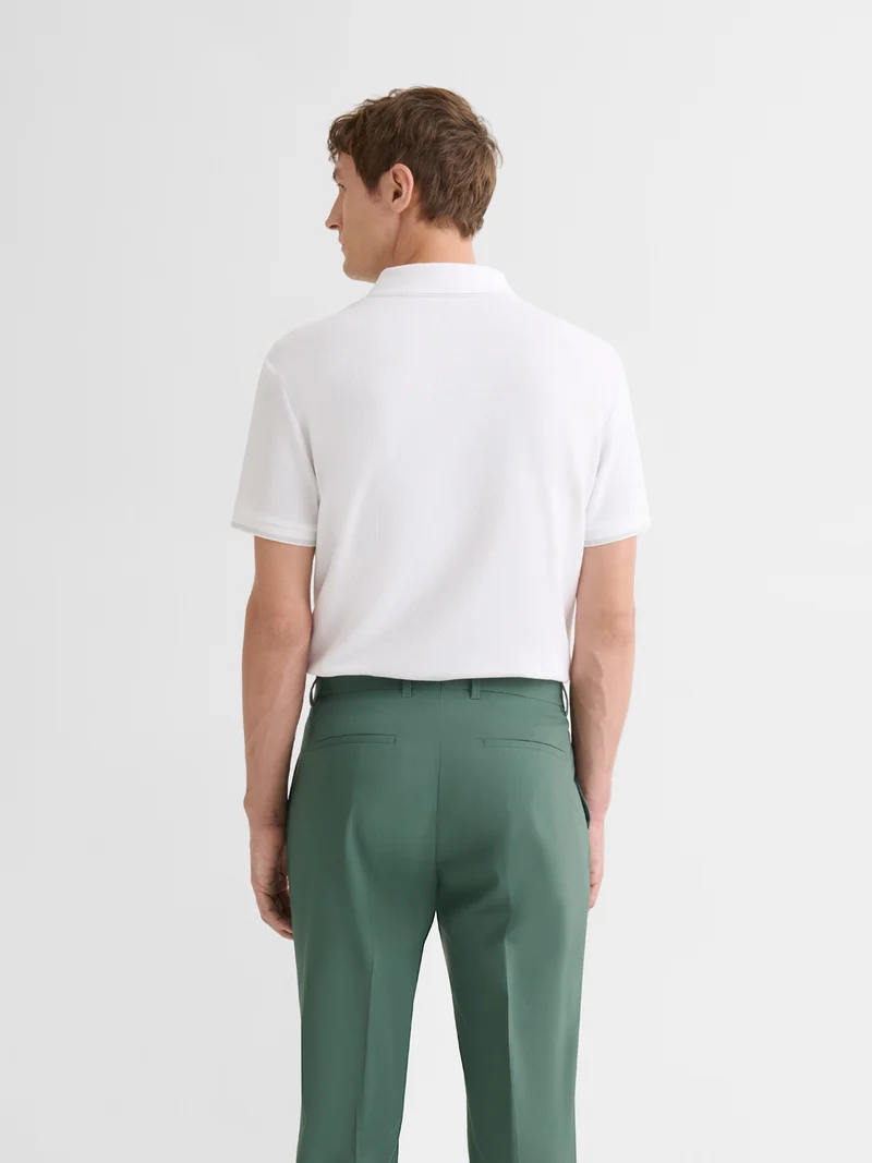 Polo boutonné gauffré
