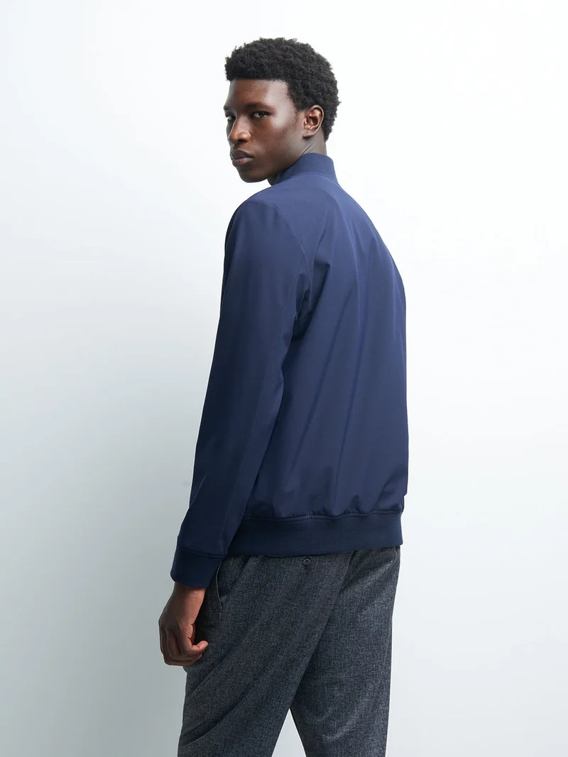 Veste legère col teddy uni