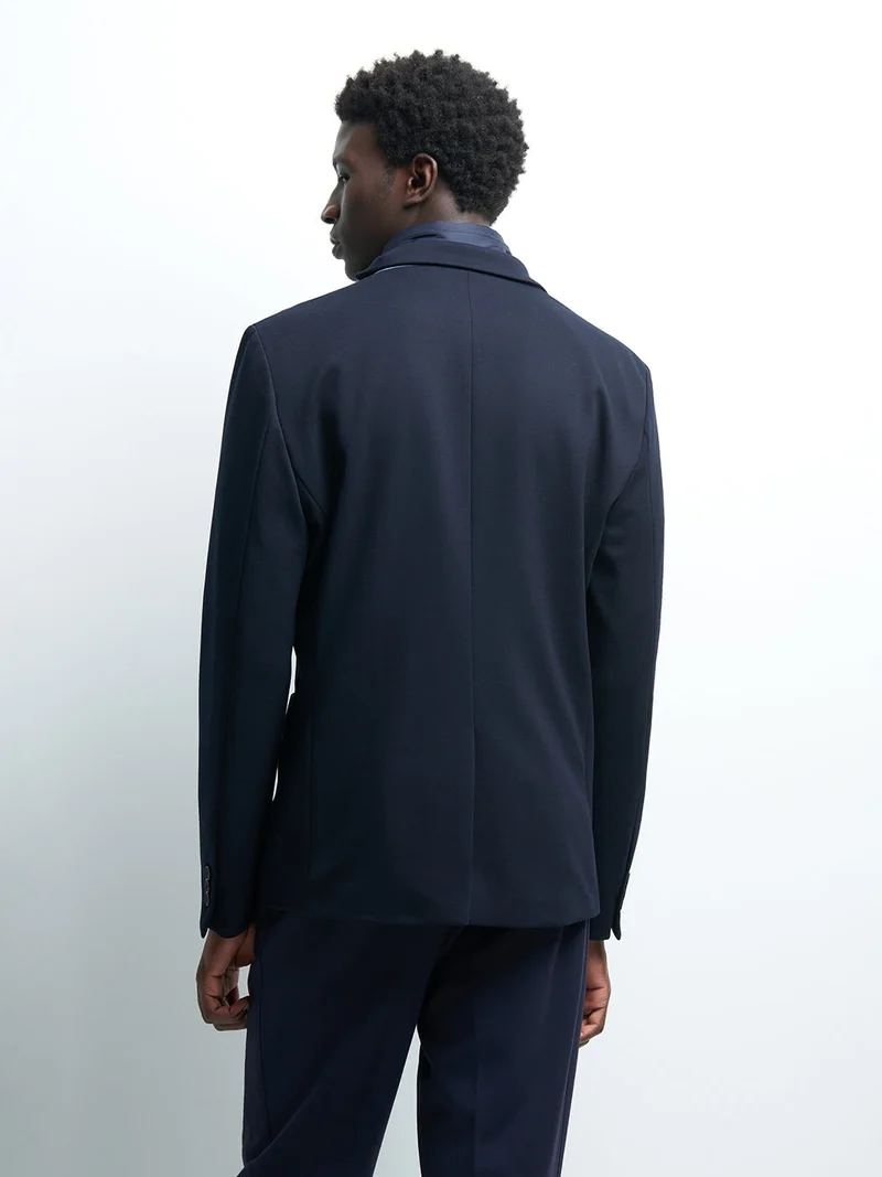 Veste à parementure slim uni