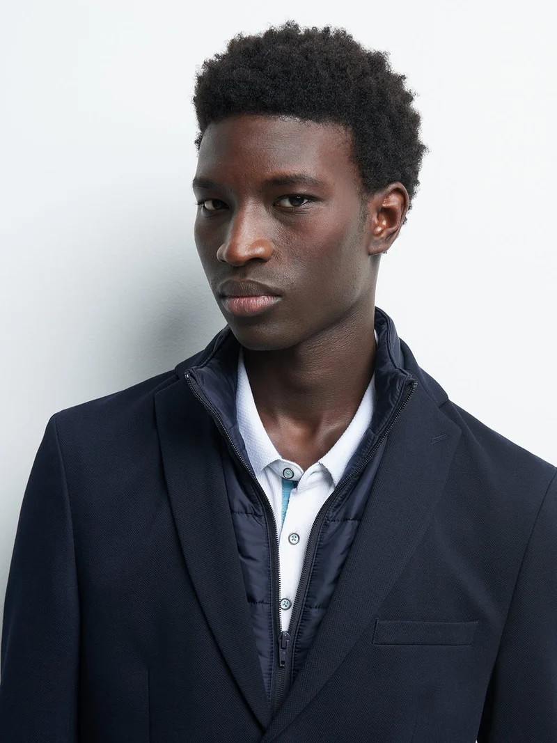 Veste à parementure slim uni