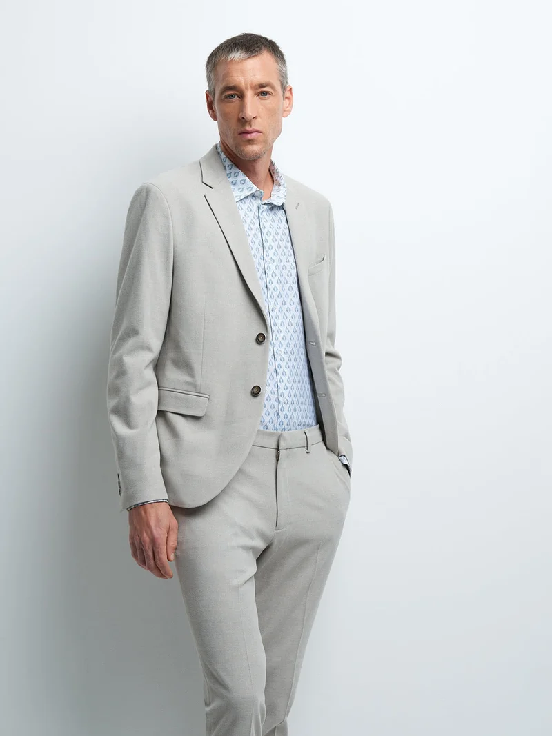 Veste coordonnable extra slim faux uni