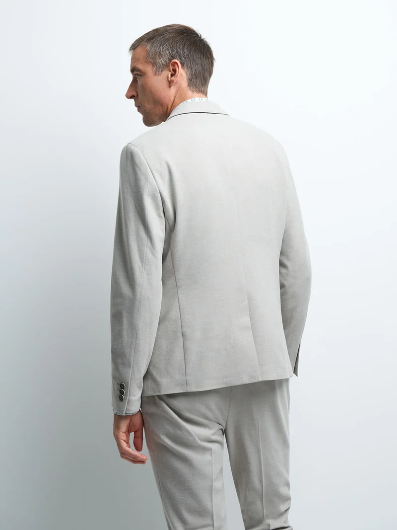 Veste coordonnable extra slim faux uni
