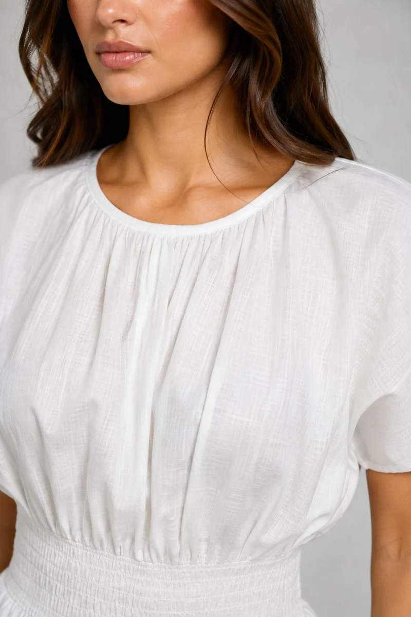 Aureli|Cotton Smocked Waist Peplum Top