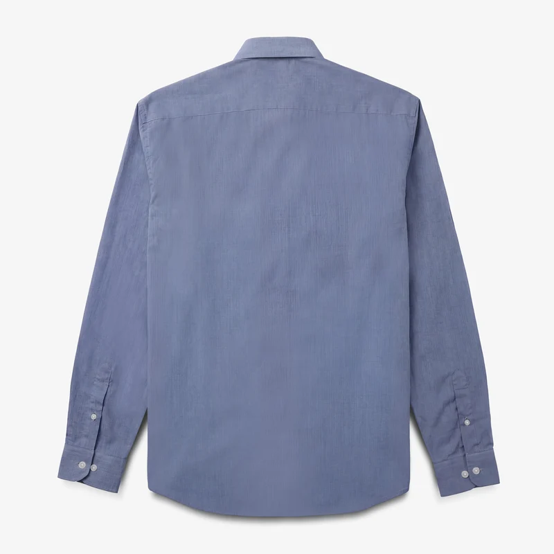 Chemise manches longues en coton bleue avec poche poitrine