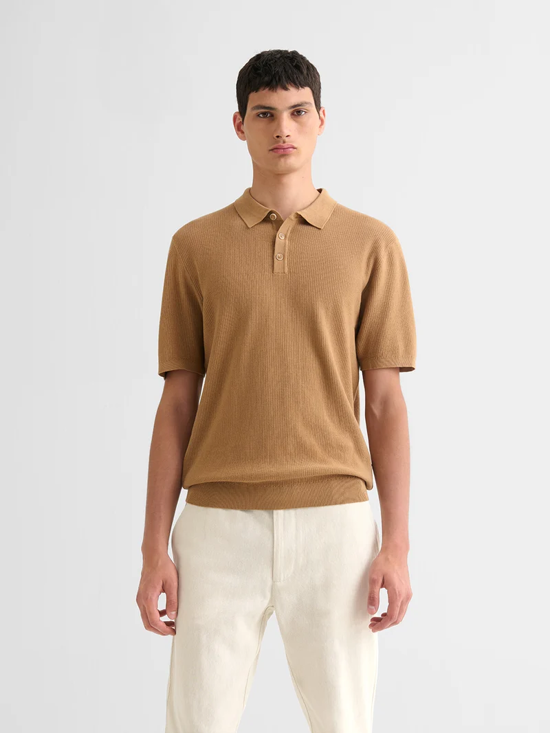 Polo col boutonné jeux de points
