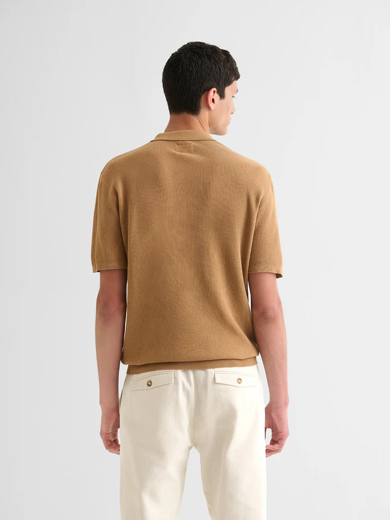 Polo col boutonné jeux de points