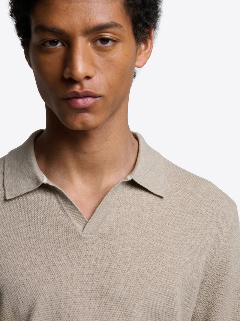 Polo maille col ouvert en coton bio
