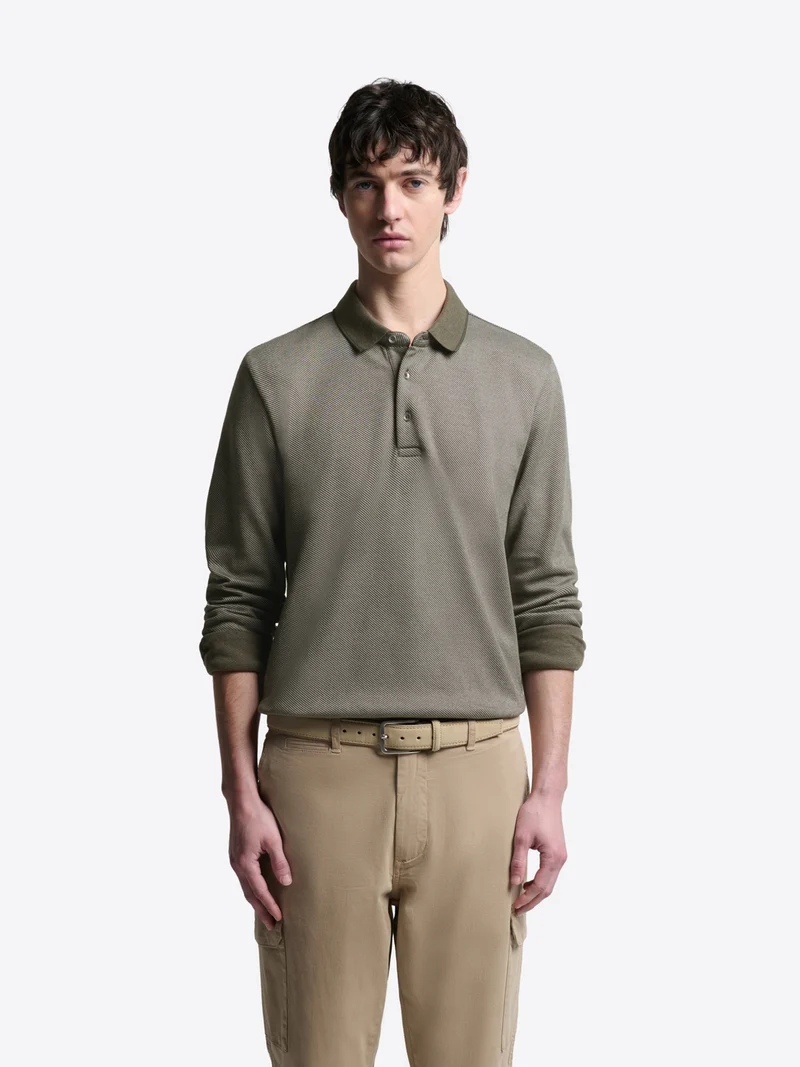 Polo manches longues en coton chiné