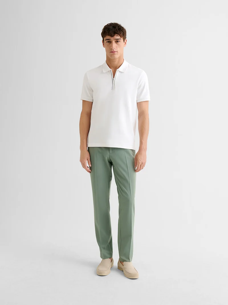 Polo zippé en coton