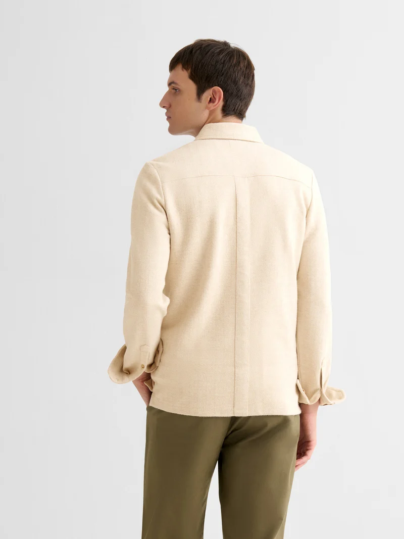 Polo boutonné en jacquard