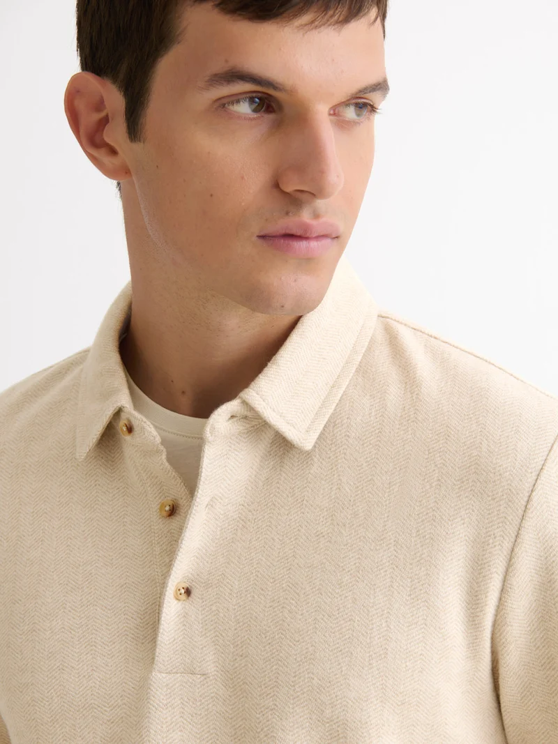 Polo boutonné en jacquard