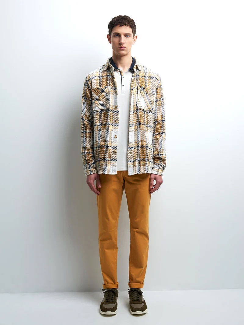 Chino slim en coton élasthane uni