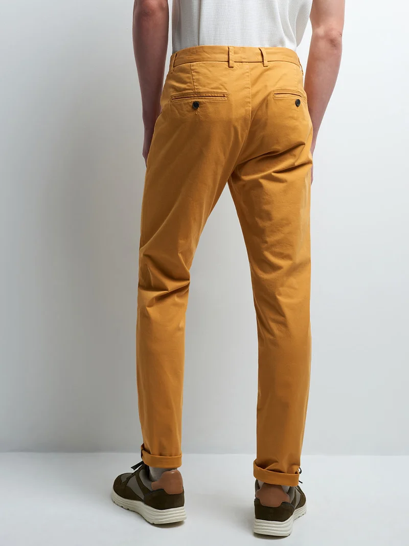 Chino slim en coton élasthane uni