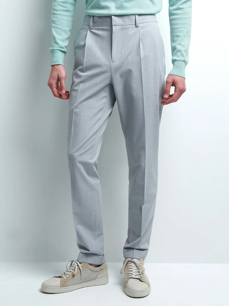 Pantalon en poly-viscose uni