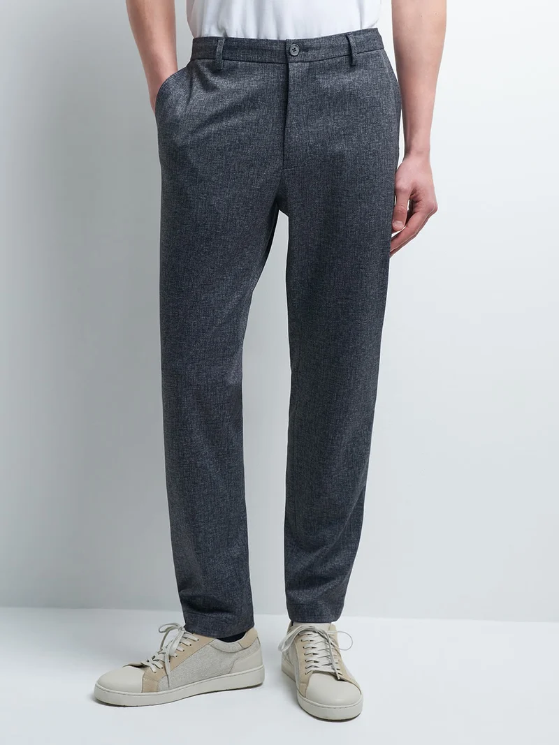 Pantalon en poly-viscose faux uni