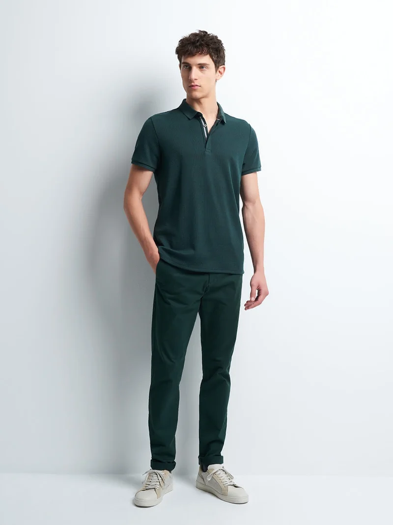 Chino slim en coton élasthane uni