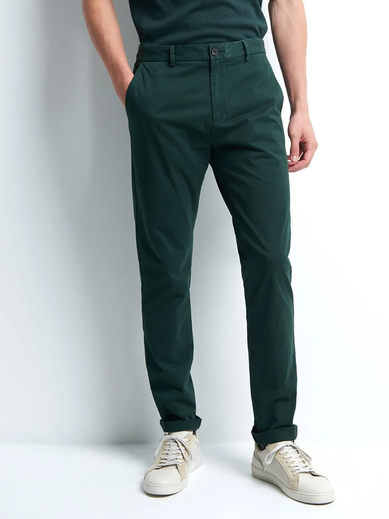 Chino slim en coton élasthane uni