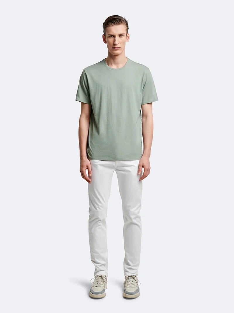 Chino slim en coton élasthane uni