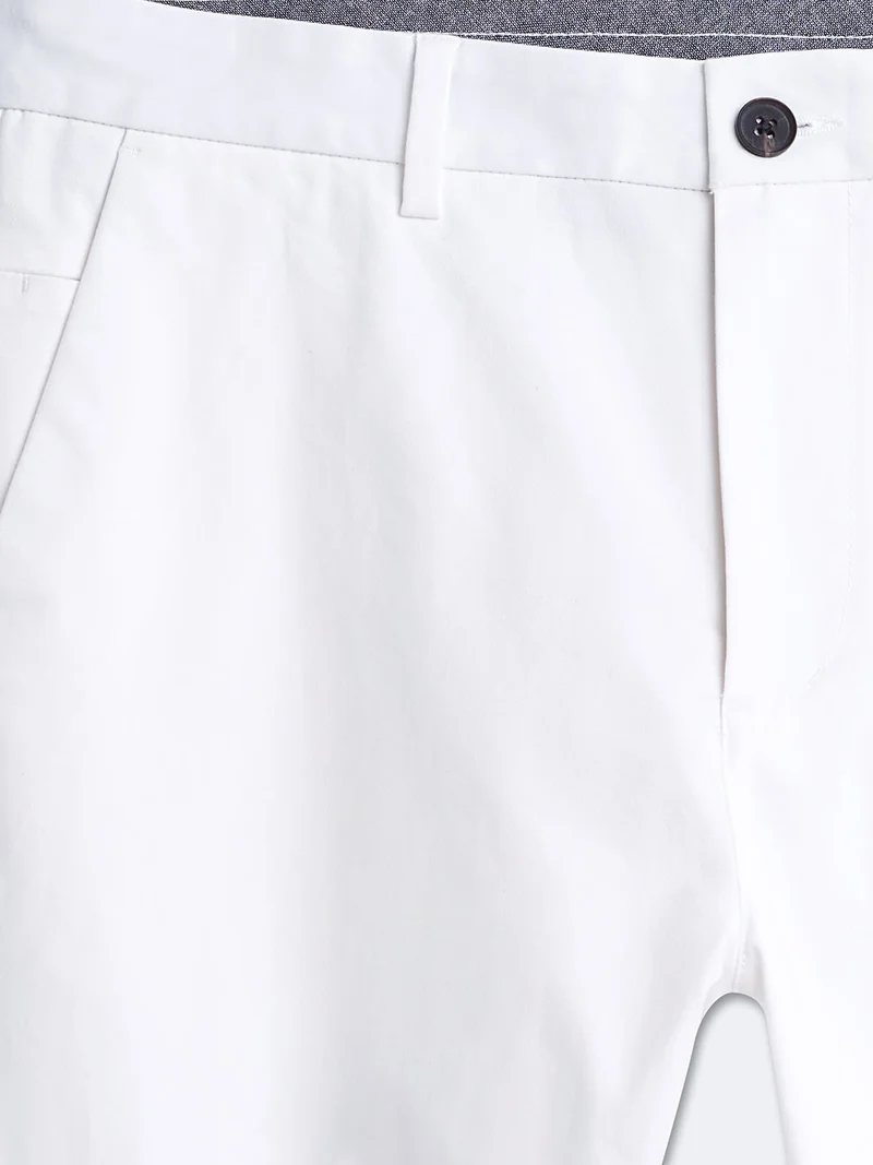 Chino slim en coton élasthane uni