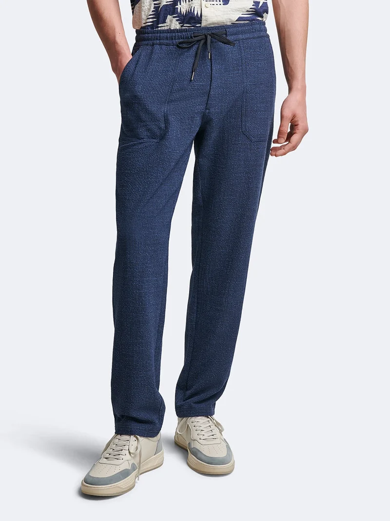 Chino en poly-viscose faux uni
