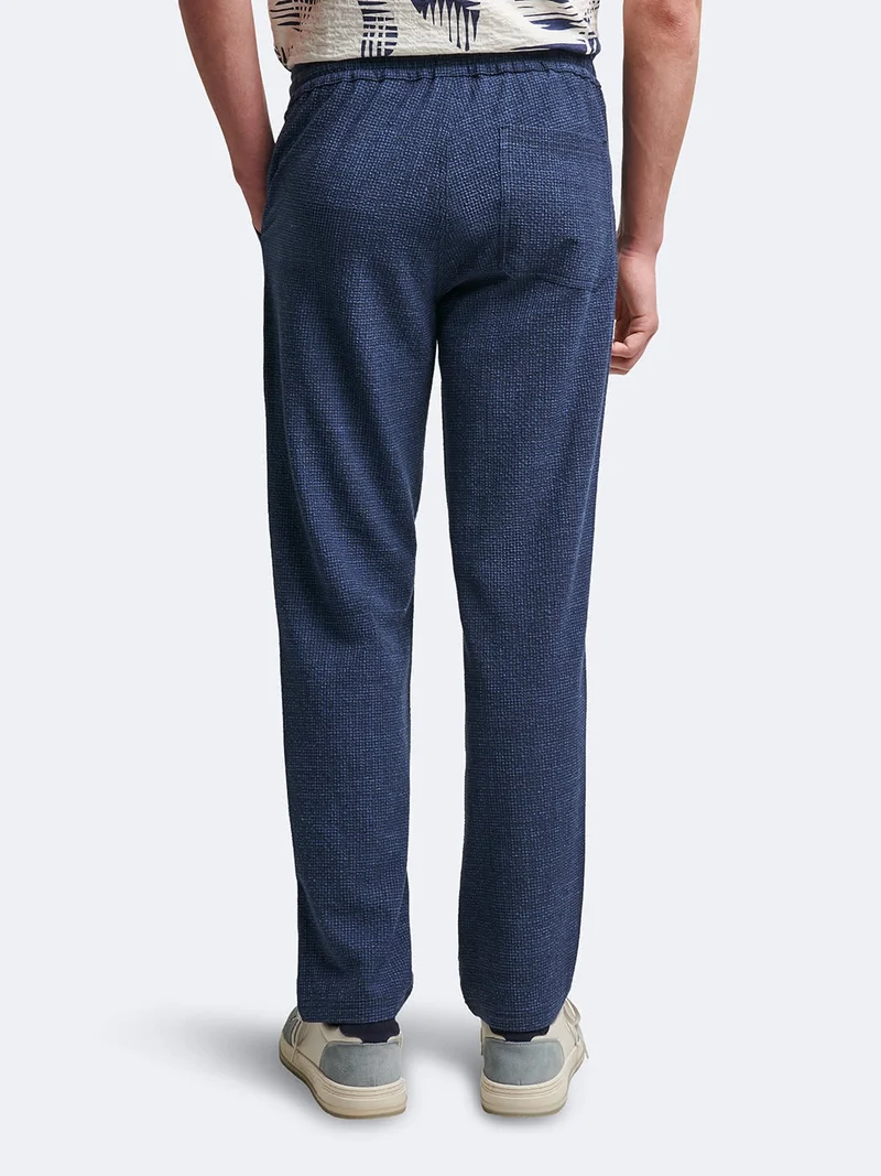 Chino en poly-viscose faux uni