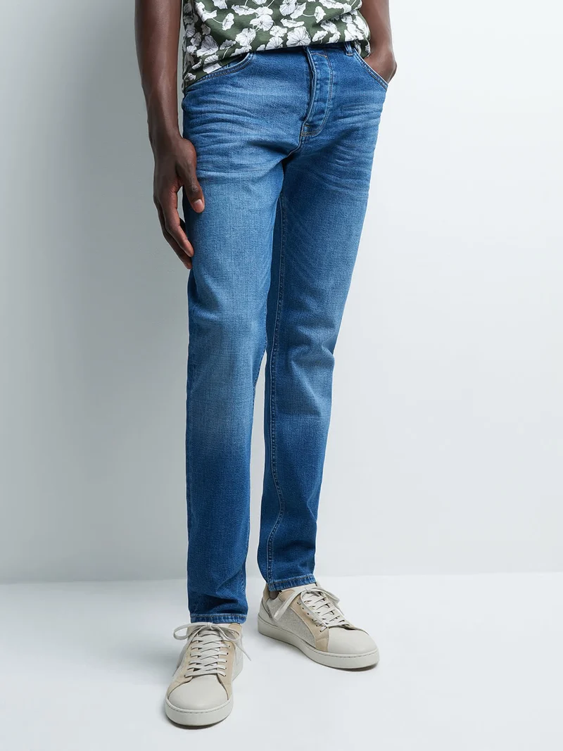 Jean denim slim en coton mélangé