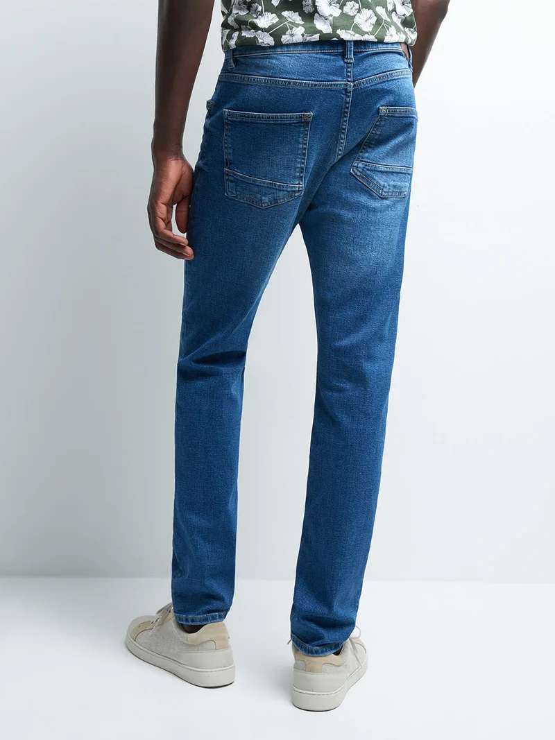 Jean denim slim en coton mélangé