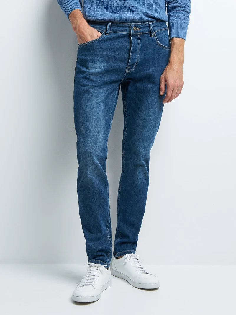 Jean denim slim en coton mélangé