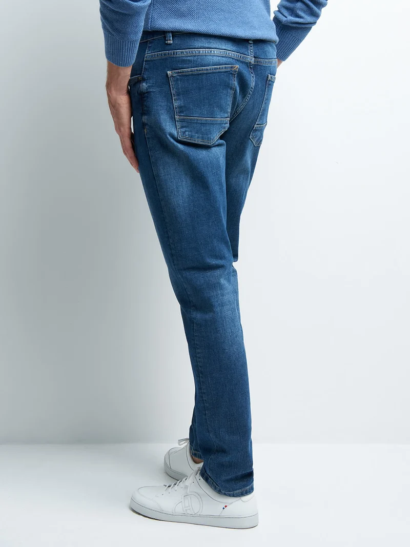 Jean denim slim en coton mélangé