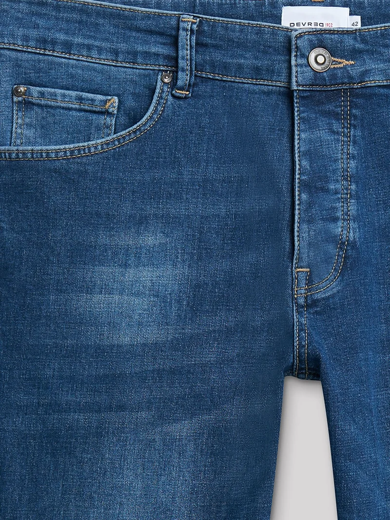 Jean denim slim en coton mélangé