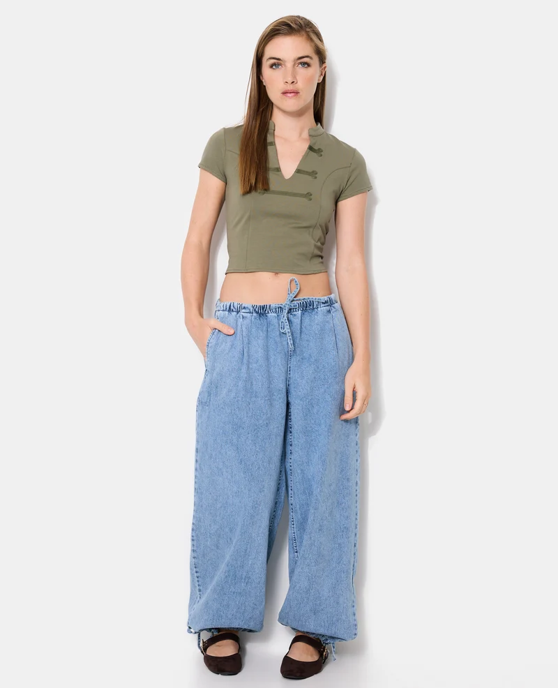Jean large avec ceinture et bas de jambe élastiqués